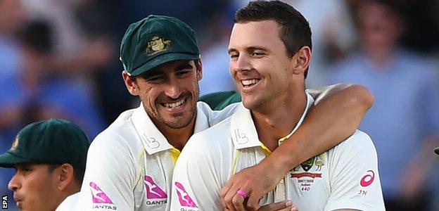 Mitchell Starc and Josh Hazlewood celebrate a wicket