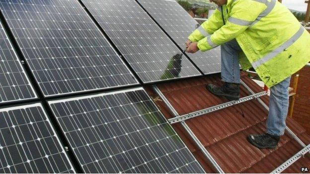 solar panels being installed