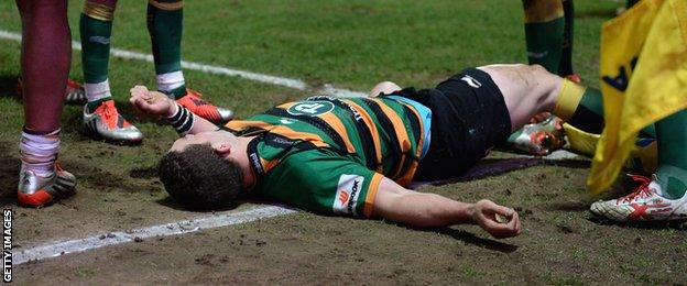 George North lies unconscious after being hit in the head while playing for Northampton last season