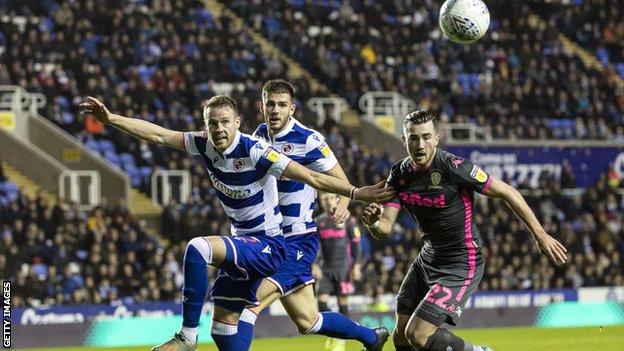 Chris Gunter in action for Reading v Leeds, clearing the ball