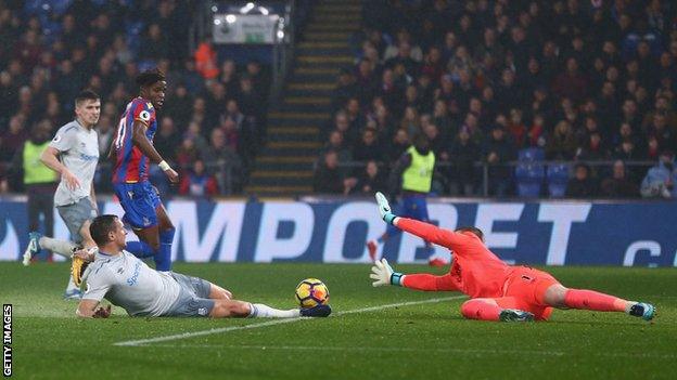 Wilfried Zaha scores Palace's second goal against Everton