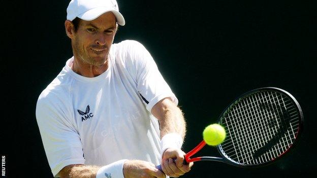 Andy Murray plays a backhand