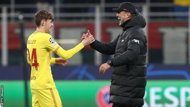 Liverpool's Conor Bradley and Jurgen Klopp