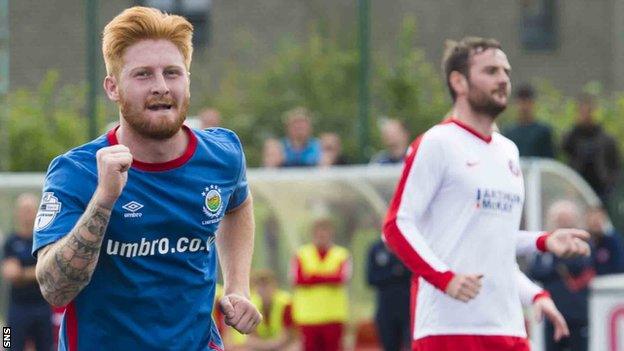 Linfield's Linfield's Louis Rooney celebrates against Spartans