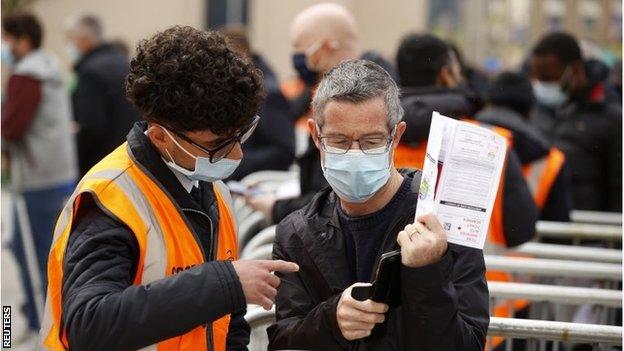 Fans had to present their ticket and a negative Covid test to be allowed into the game