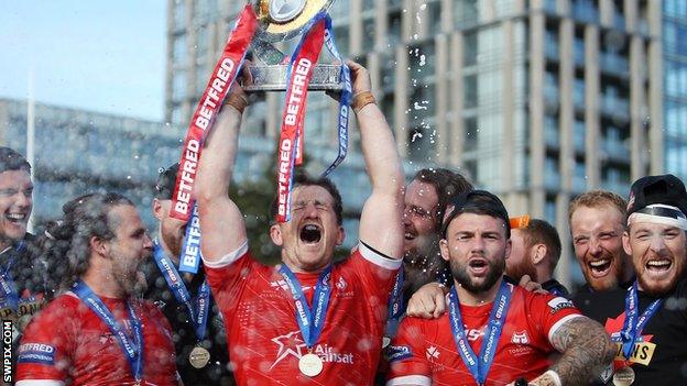 Toronto Wolfpack skipper Josh McCrone celebrates promotion to Super League