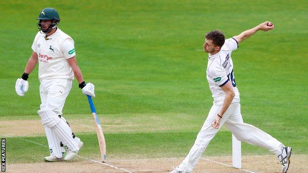 Side-on view of Ben Coad bowling for Yorkshire against Nottinghamshire