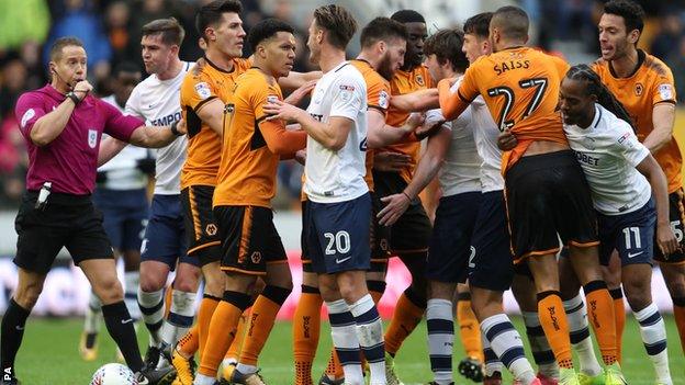 Referee Steve Martin (left)