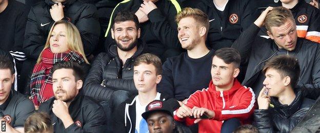 Ex-Dundee United players Nadir Ciftci (centre left) and Stuart Armstrong watched from the stand