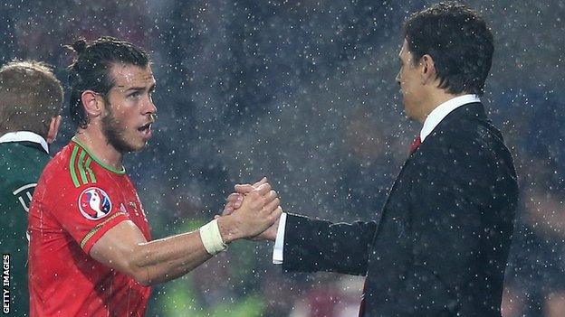 Gareth Bale is greeted by Wales manager Chris Coleman