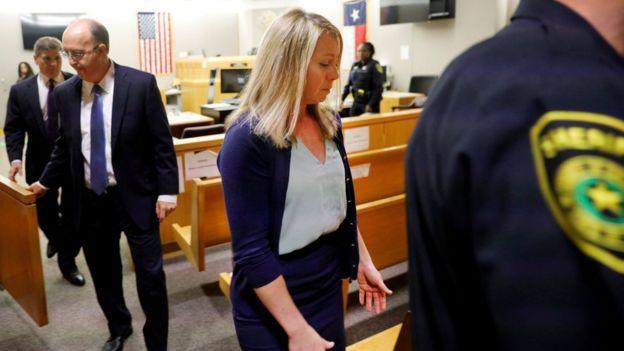 Amber Guyger is escorted from the courtroom after being found guilty on Tuesday