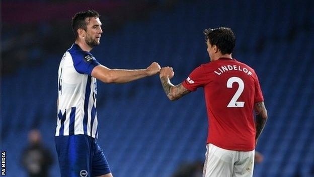 Brighton & Hove Albion's Shane Duffy in action against Manchester United