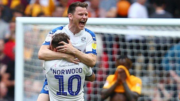 Connor Jennings of Tranmere Rovers celebrates with James Norwood