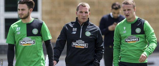 Brendan Rodgers (centre) makes a point to Celtic striker Leigh Griffiths (right)