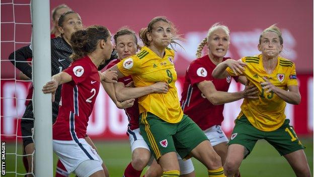 Josie Green having shirt pulled in Norway match