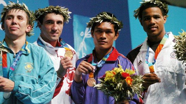 Golovkin (left) lost to Gaydarbekov (second left) in the 2004 Olympic final