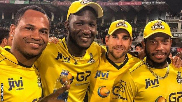 Dawid Malan, second right, helped Peshawar Zalmi win the Pakistan Super League earlier this year