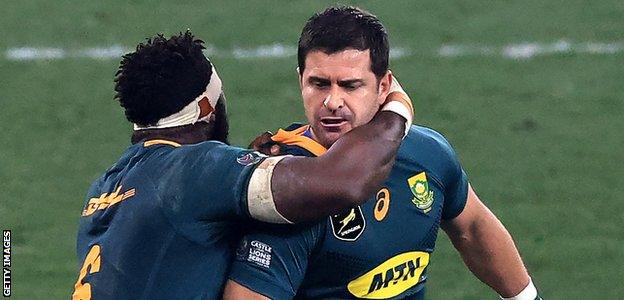 South Africa captain Siya Kolisi congratulates Morne Steyn