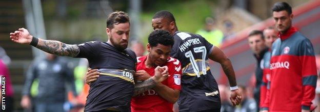 Chris Maguire, left, was at Bury during the 2017-18 season