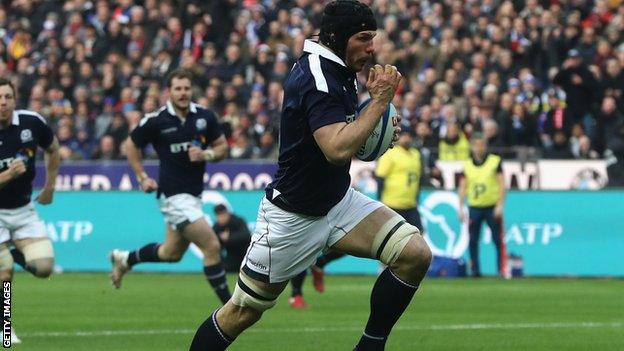 Tim Swinson scores a try for Scotland