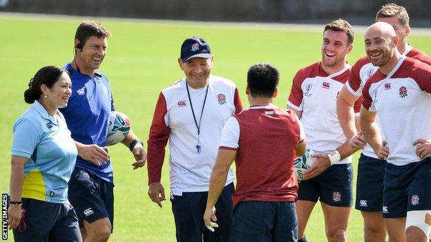 Eddie Jones talks during training