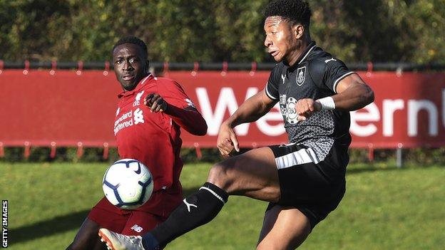 Ali Kioki (right) in action for Burnley under-23s