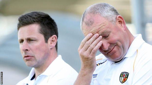 Frank Fitzsimons (right) shows his frustration during Antrim's defeat by Donegal in May as Gearoid Adams also watches on