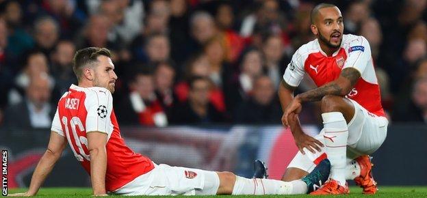 England and Arsenal forward Theo Walcott (R) has also suffered with injury problems