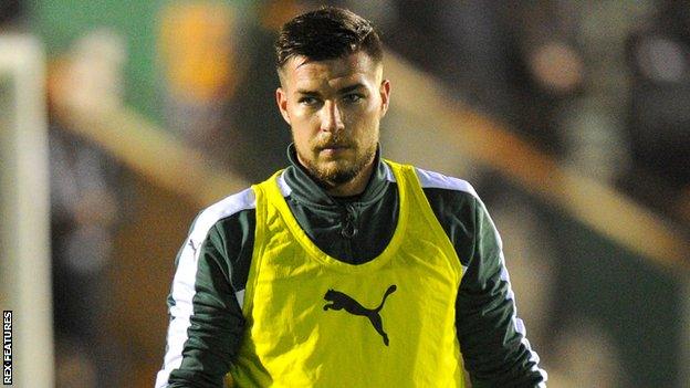 Jakub Sokolik warming up for Plymouth