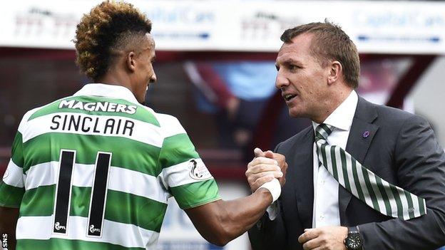 Celtic winger Scott Sinclair is congratulated by manager Brendan Rodgers