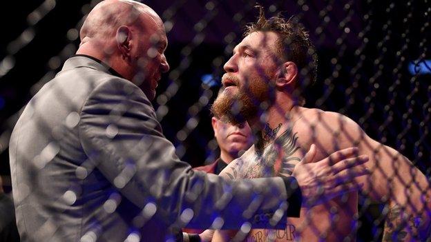 UFC president Dana White tried to speak to a stunned McGregor in the aftermath of the contest