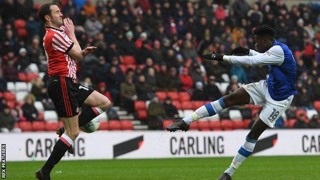Lucas Joao strikes Sheffield Wednesday's opening goal past defender John O'Shea's attempted block