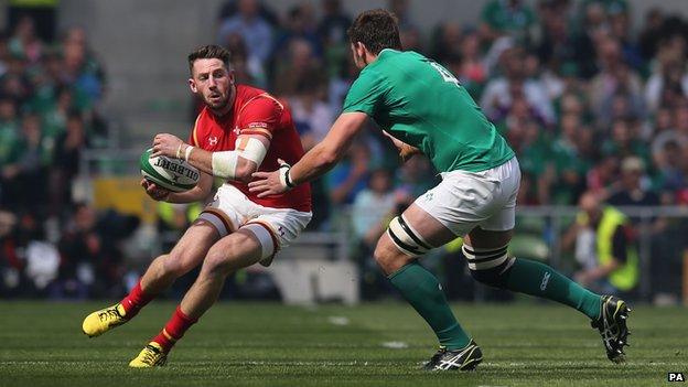 Wales' Alex Cuthbert in action against Ireland's Iain Henderson during the World Cup Warm Up Match