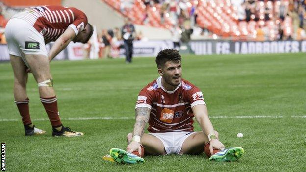 Wigan players dejected