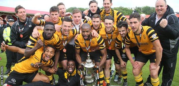 Maidstone United celebrate promotion to the top flight of non-league football after winning the play off against Ebbsfleet United in May 2016