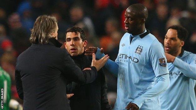 Former Manchester City boss Roberto Mancini and Yaya Toure