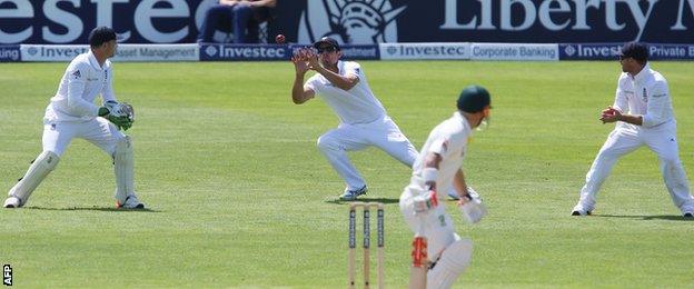 Alastair Cook catches David Warner off the bowling of James Anderson