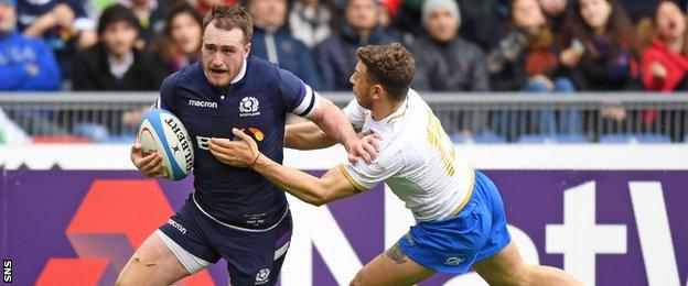 Stuart Hogg scores a try for Scotland against Italy