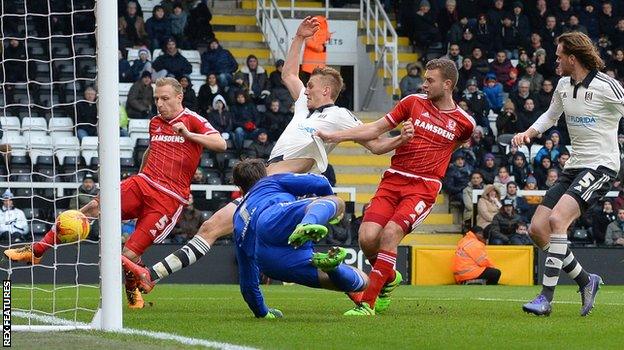 Middlesbrough's Ritchie De Laet's clears Michael Madl's header off the line during the game against Fulham