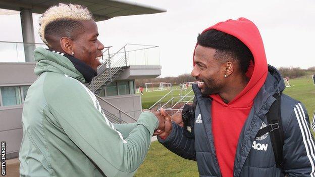 Manchester United midfielder Paul Pogba and Denver Broncos wide receiver Emmanuel Sanders