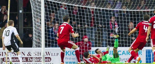 Alan Forrest (left) pulled one back for Ayr United before half-time