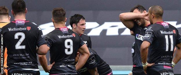 Ospreys look dejected after their defeat by Ulster