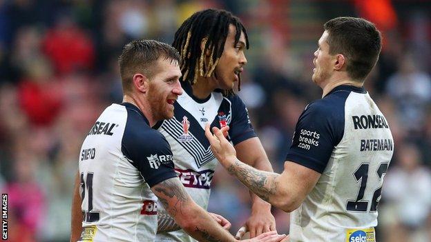 England's Dom Young (centre) is congratulated by Andy Ackers and John Bateman