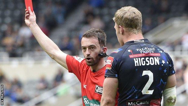 Adam Higson shown a red card