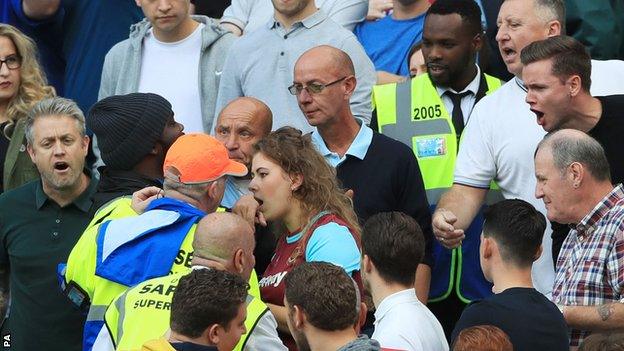 Fans confront stewards during West Ham's game against Middlesbrough