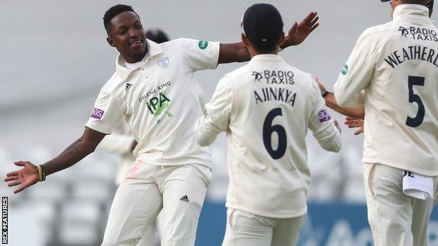 Fidel Edwards celebrates taking a wicket with his Hampshire teamamtes