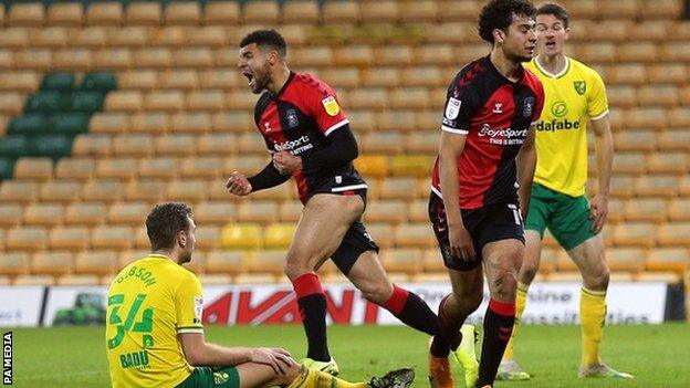 Maxime Biamou celebrates