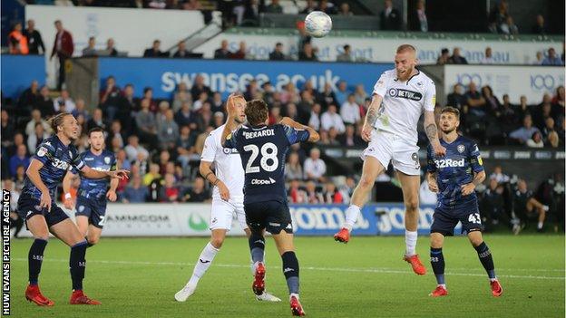 Oli McBurnie's header had put Swansea 2-1 ahead before Pablo Hernandez rescued a point for Leeds