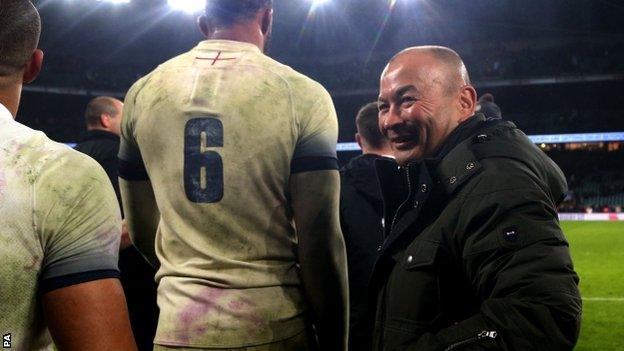 Eddie Jones congratulates his England players after their win over Wales