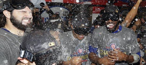 Victorious Cubs players celebrate their win